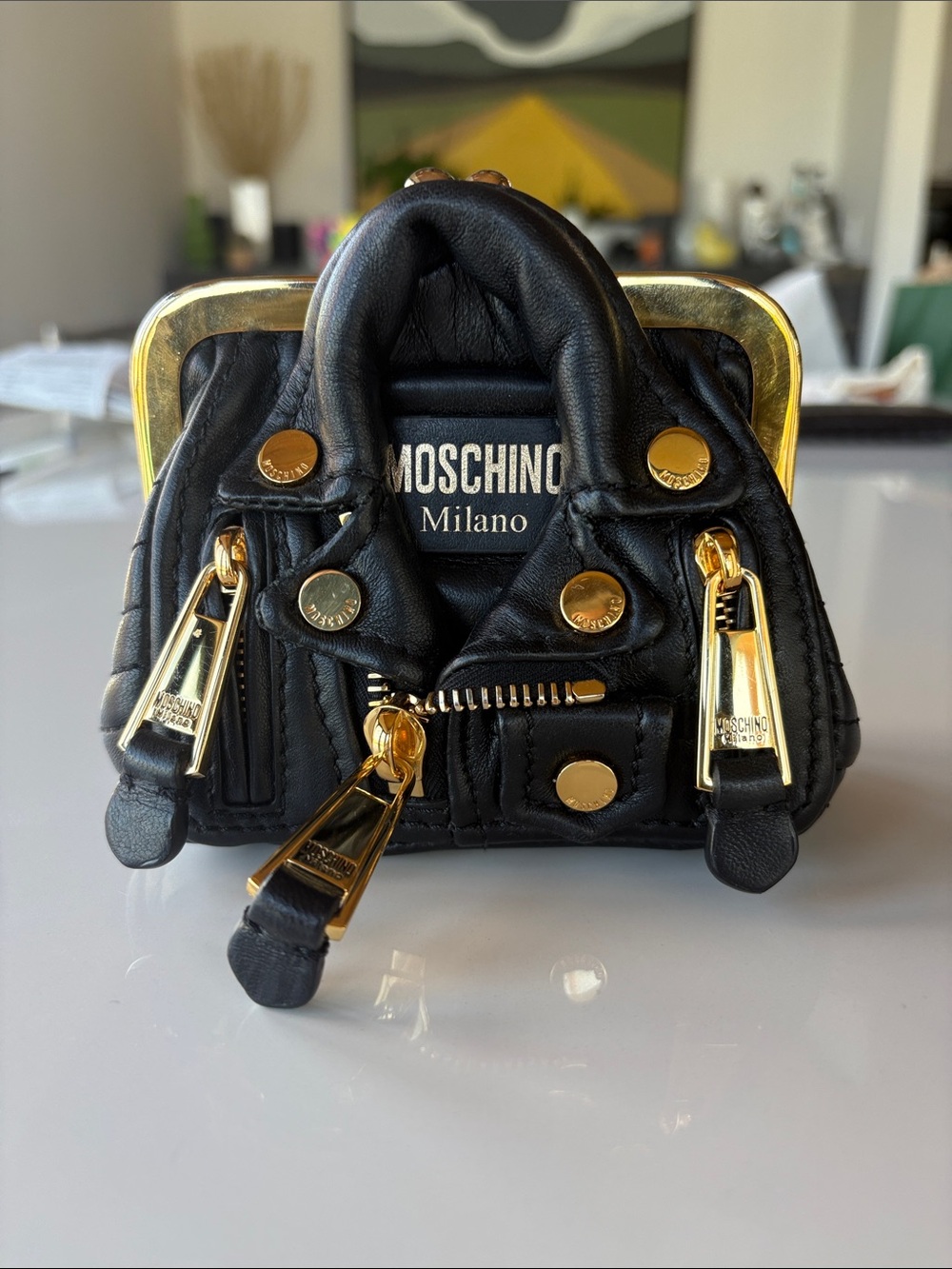 Moschino Black Quilted Mini Bag with Gold Hardware Accents